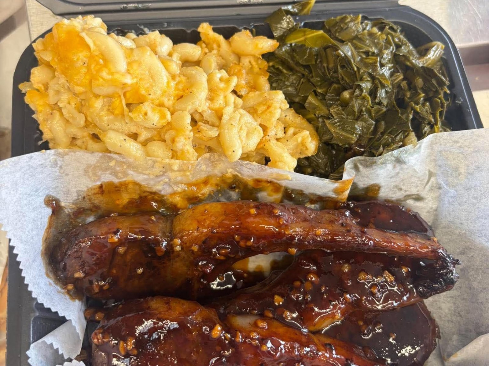 Glazed lamb chops with macaroni and cheese and slow-cooked collard greens