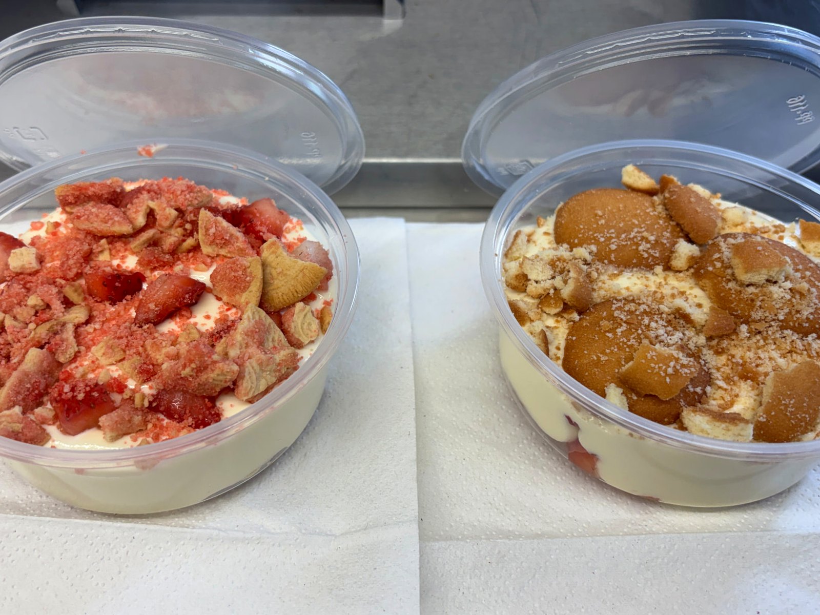 Homemade banana pudding and strawberry banana pudding cups topped with vanilla wafers